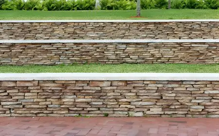 The Pros and Cons of Building a Brick vs Stone Wall for Your Home