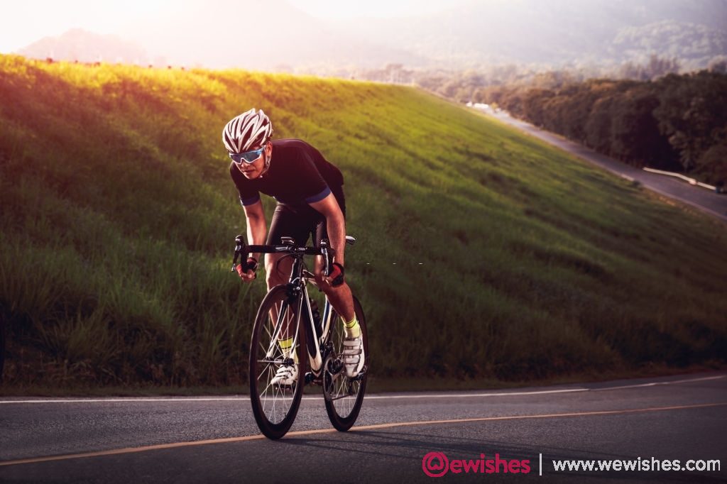 Cyclist in maximum effort in a road outdoors