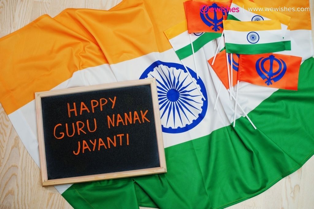 Happy Guru Nanak Jayanti theme. Board with flags.