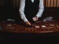 man displaying cards in casino